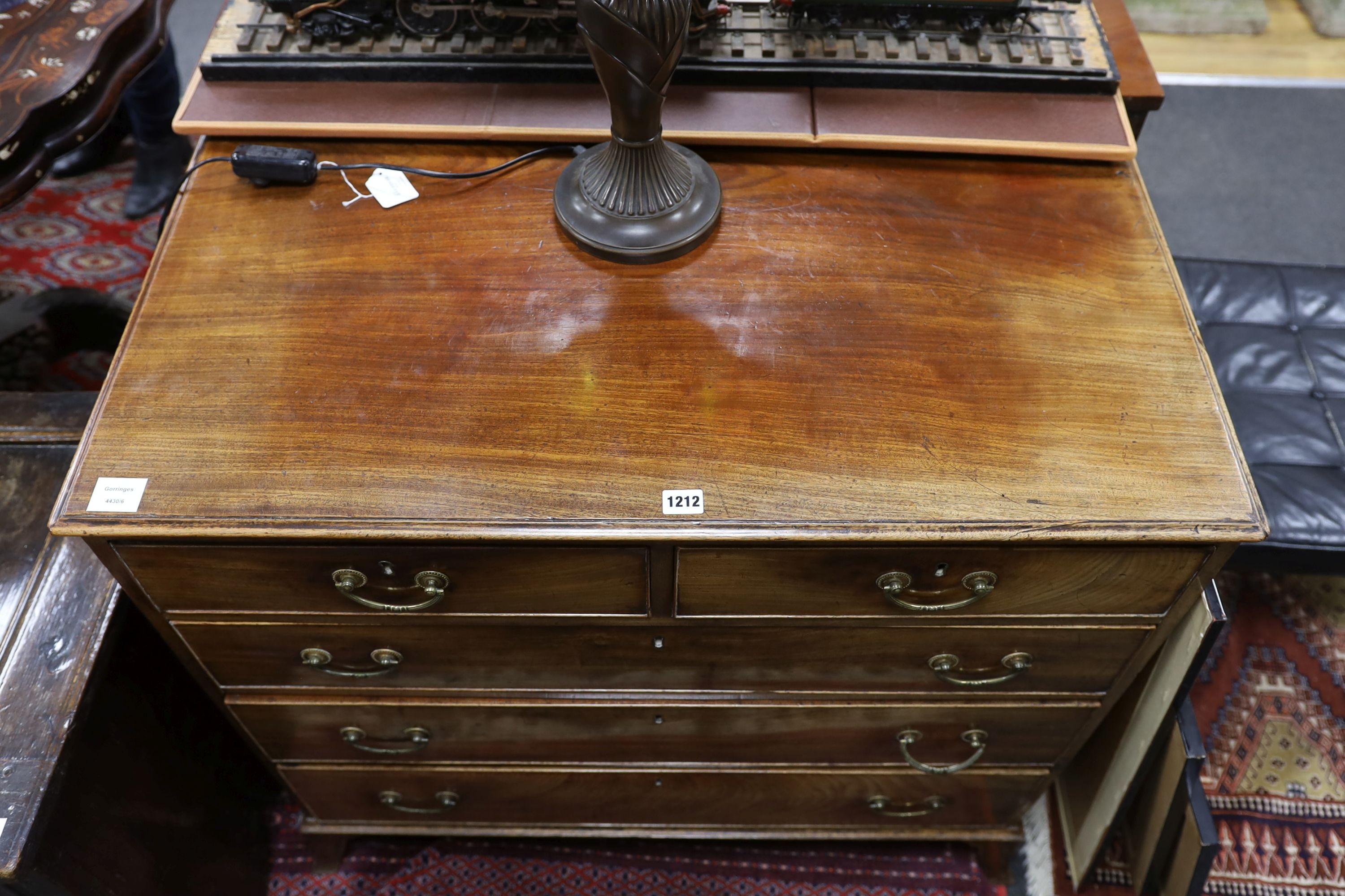 A George III mahogany chest, fitted two short and three long oak lined drawers, width 95cm, depth 51cm, height 89cm